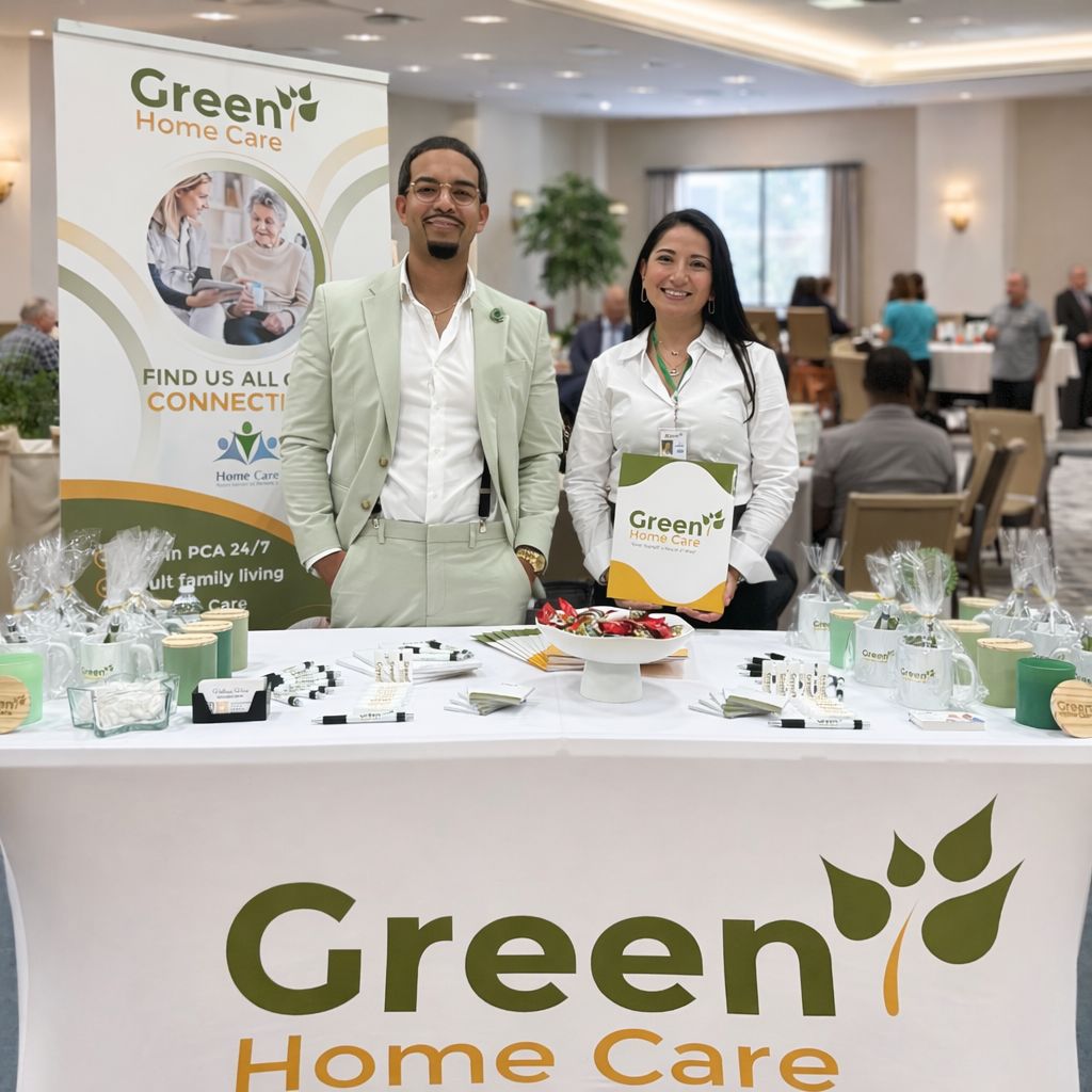 Owner and coordinator standing in a confrence