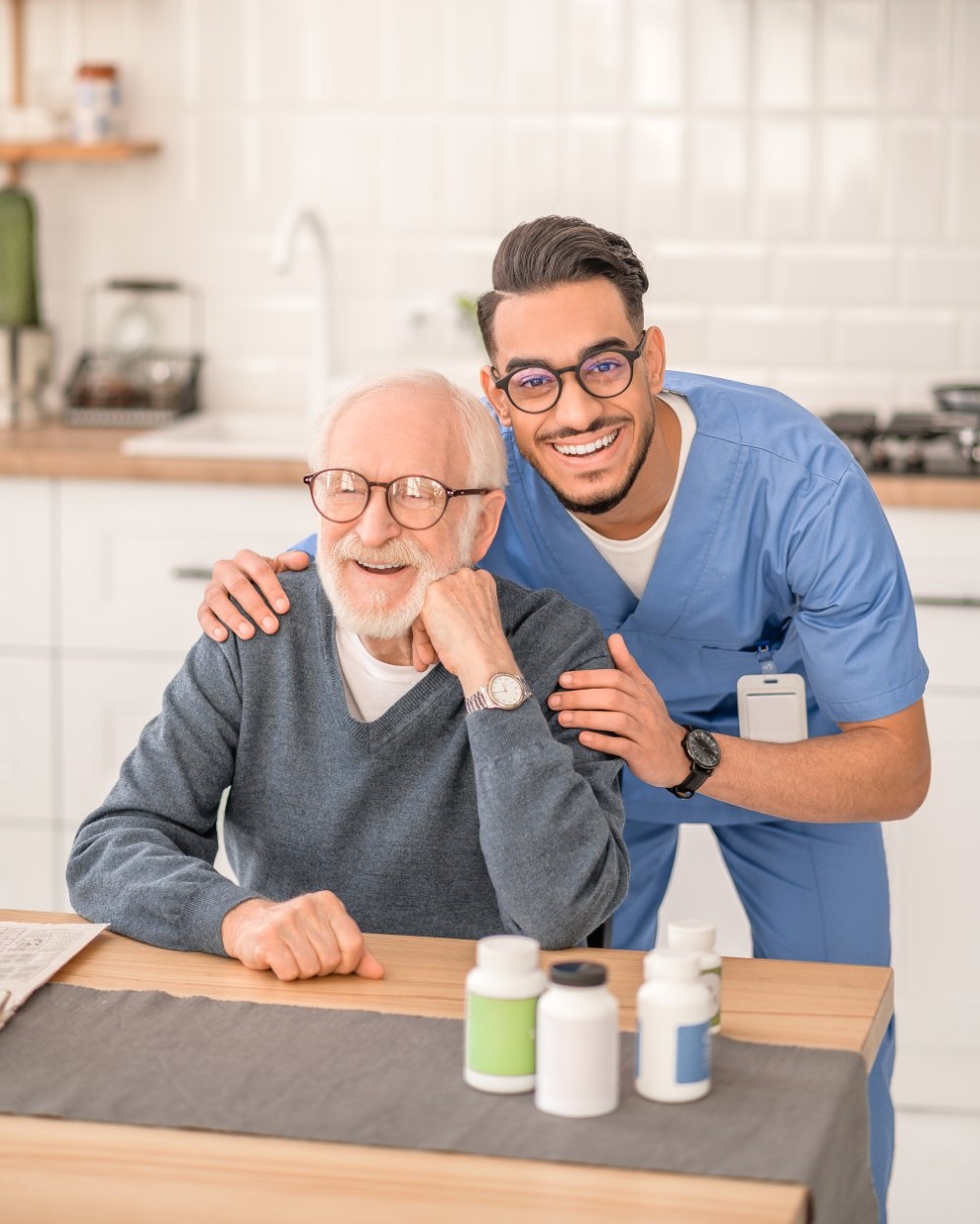 A caregiver with an older adult in a home setting