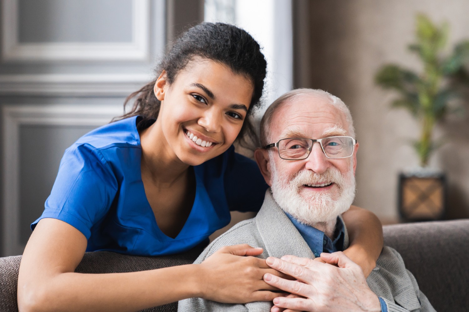 A caregiver speaking with an older adult