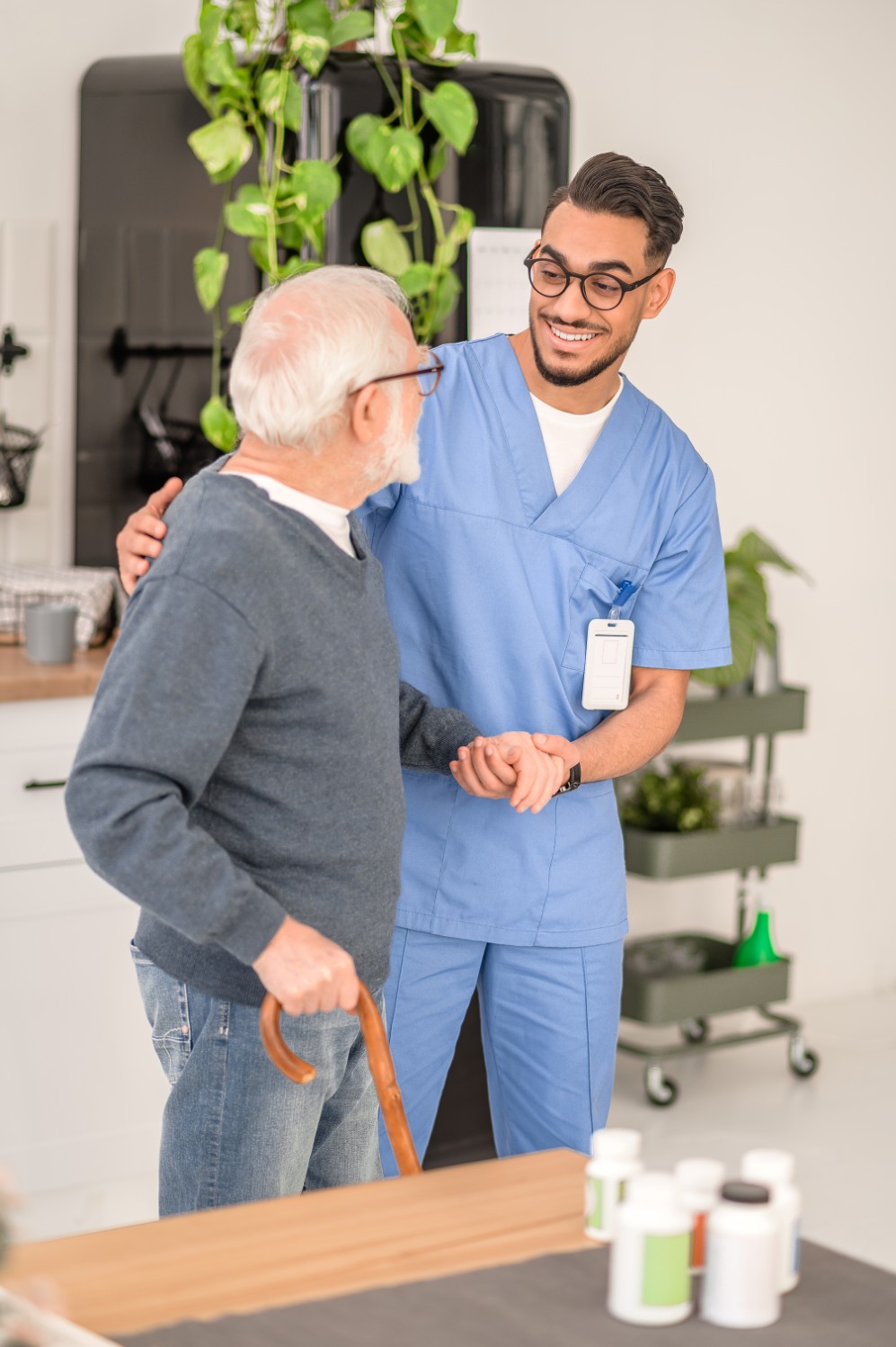 A caregiver supporting an older adult in Hartford